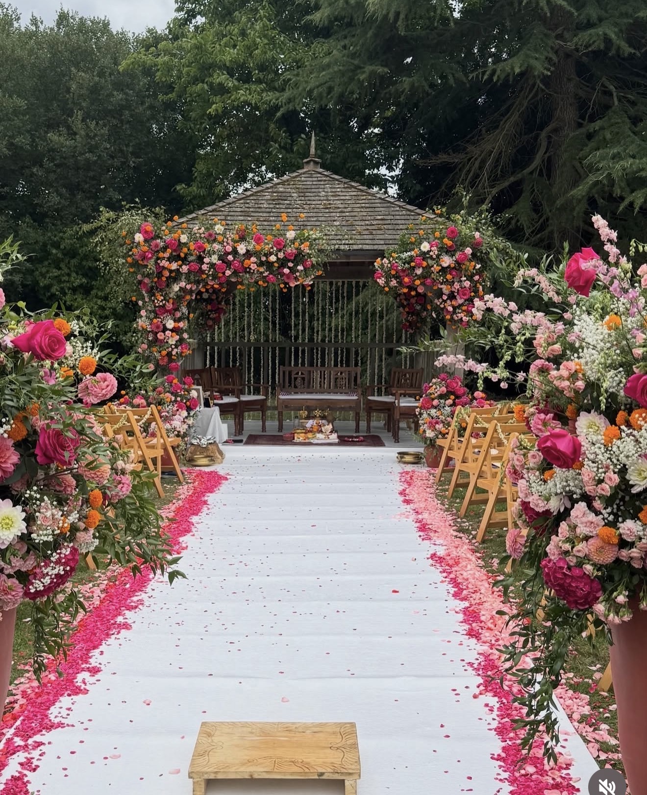 Indian wedding ceremony aisle with floral wedding decoration
